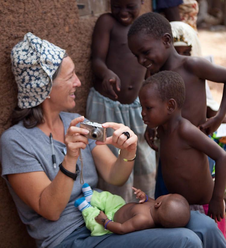Photo of Kelly Callahan with children in Ghana