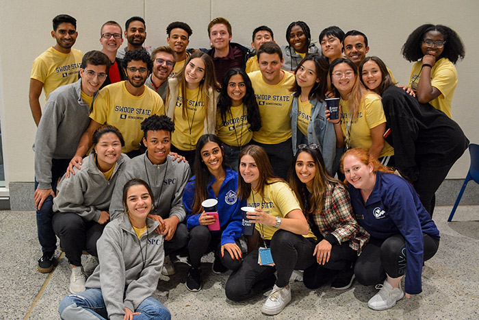 A huge group of students pose for a photo